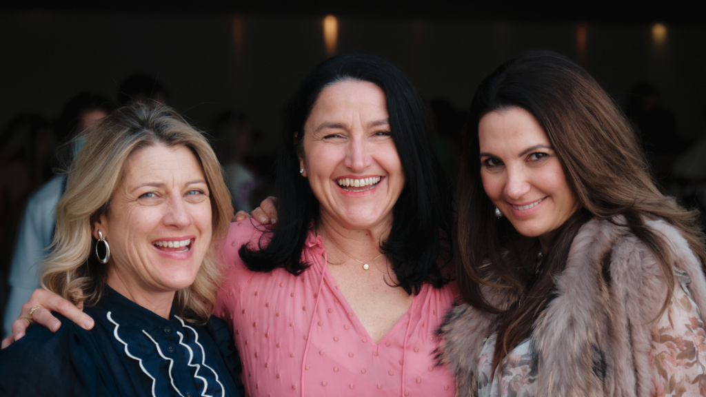 Three Ladies Looking At Camera