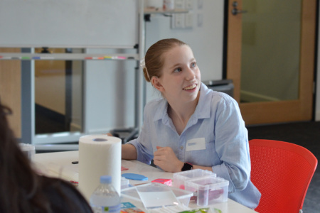 Young Adult Sitting At Table